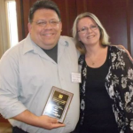 Dr. Tony Castro, awarded the 2015 University of Missouri Excellence in Service-Learning Award for Faculty, pictured with Dr. Foley